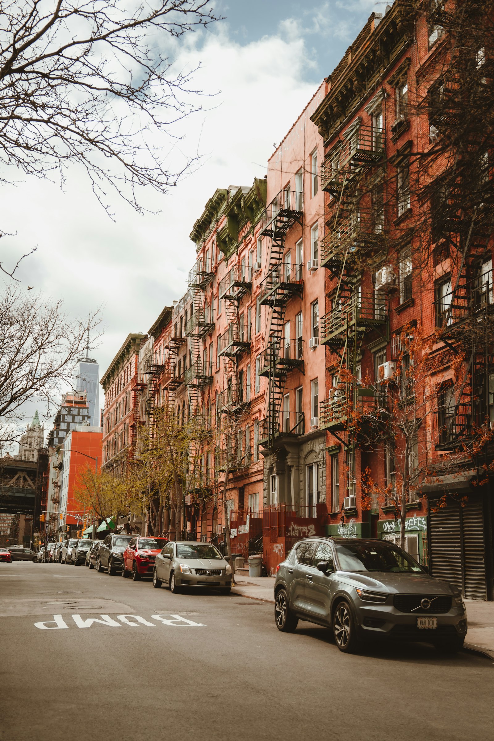 Real photograph of a residential street of walk-up buildings on the Lower East Side, Manhattan